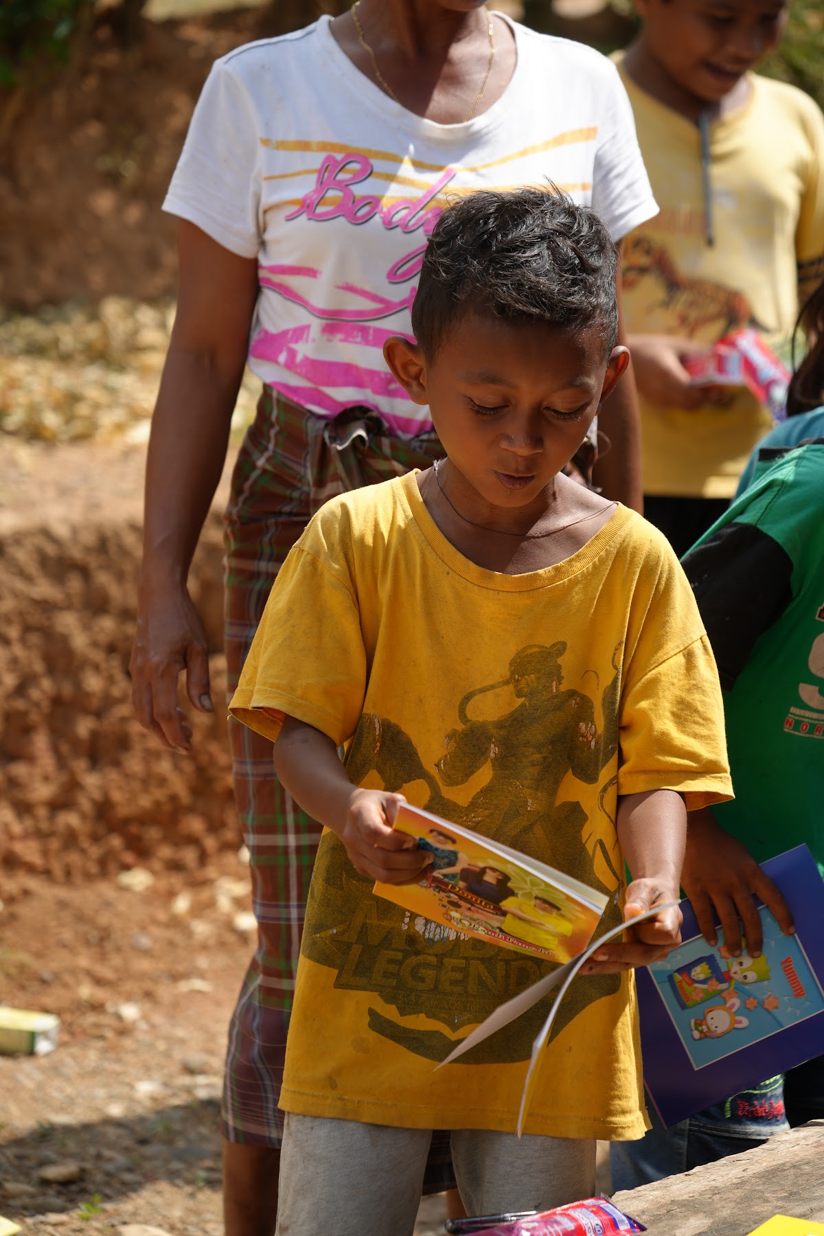 A boy reading a new picture book